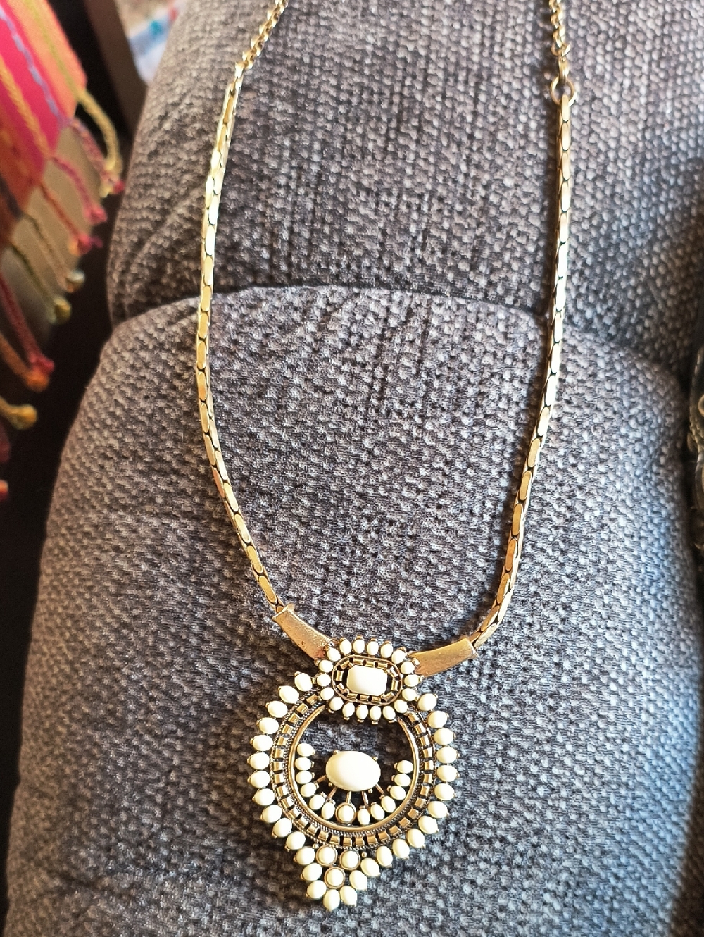 Gold Tone Necklace with White Bead Pendant